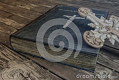 Exorcism book on wooden floor Cartoon Illustration