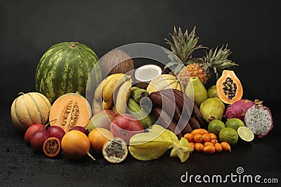 Exotic fruit arrangement on black background Stock Photo