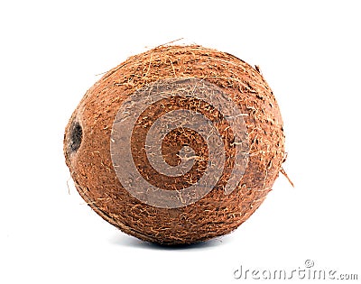 Exotic fruit coconut. Close fresh, organic, brown coconut, on a white background. A tasty whole coconut. Stock Photo