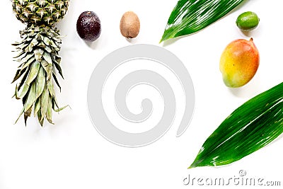 Exotic fruits food concept. Mangosteen, mango, kiwi, pineapple on white background top view copyspace Stock Photo