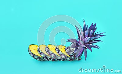 Exotic of pineapple slice on pastel color background. Stock Photo