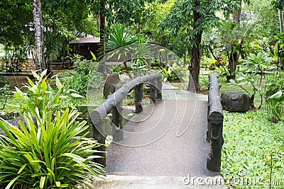 Exotic thai garden with plants and trees asian style Stock Photo