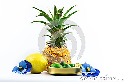 Exotic tropical fruit mix hawaii theme with flowers on white isolated background Stock Photo