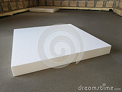 Expanded polystyrene layer on concrete subfloor Stock Photo