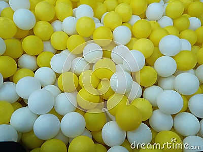 expanse of yellow and white balls Stock Photo