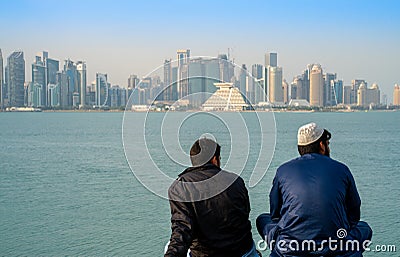 Expat workers enjoying the view of doha city during evening on a winter Editorial Stock Photo