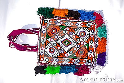 Expensive colorful bag,beautiful indian traditional bags,embroidery handbag,traditional bags-wallet on white background Stock Photo