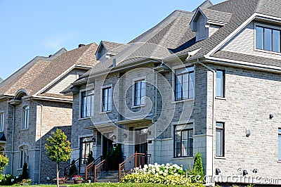 Expensive modern townhouses with huge windows Stock Photo