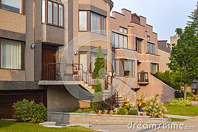 Expensive modern townhouses with huge windows Stock Photo