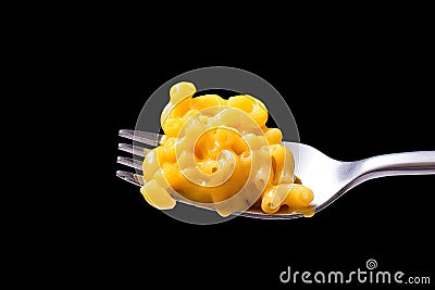 A Taste of Cheesy Bliss: Isolated Macaroni and Cheese on a Fork - Irresistible Temptation Stock Photo