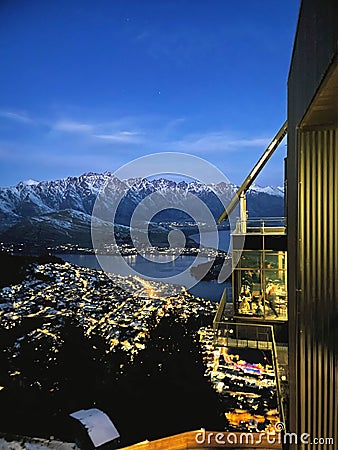 Queenstown, New Zealand - 02 March 2024: Queenstown from Skyline during winter, showcasing The Remarkables mountain and dining Editorial Stock Photo