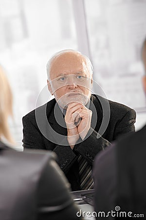 Experienced businessman concentrating Stock Photo