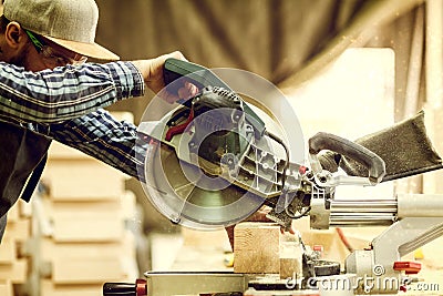 Experienced carpenter in workshop Stock Photo