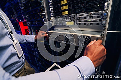 Experienced data center engineer doing hardware refresh Stock Photo