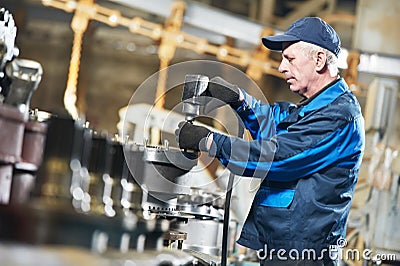 Experienced industrial assembler worker Stock Photo