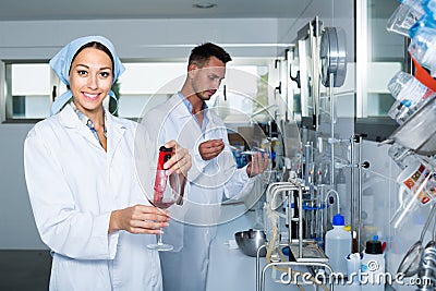 Experts making tests in winery laboratory Stock Photo