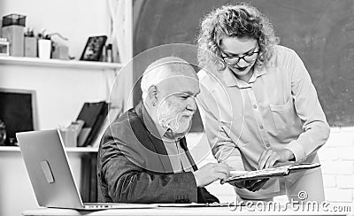 Explaining difficult information. Solving math tasks. Book source knowledge. School book concept. Help me please. Check Stock Photo