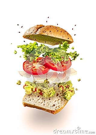 Exploded vegetarian sandwich with guacamole and tofu on white Stock Photo