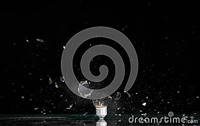 Exploding lamp bulb Stock Photo