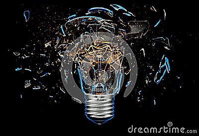 Exploding light bulb on a blue background, Stock Photo