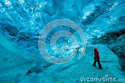 Explorer inside an ice cave, vatnajokull national park, Iceland Editorial Stock Photo