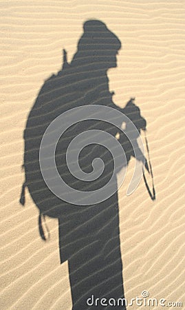 Explorer's shadow in sand, Nam Stock Photo