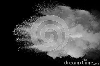 Explosion of white dust on black background Stock Photo