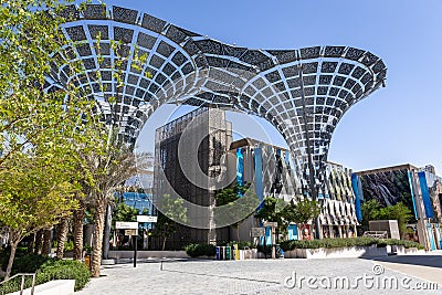 Expo 2020 Mobility District with artificial modern tree structures and Jamaica Pavilion, Dubai. Editorial Stock Photo