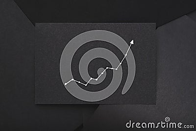 Exponential graph growth progress black paper Stock Photo