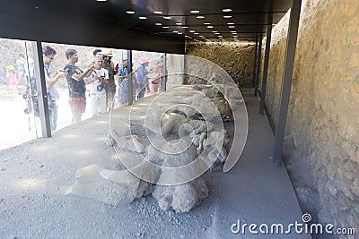 Exposed dead people covered with volcanic ash in the Pompeii museum Editorial Stock Photo