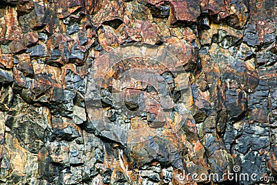 Close up texture of jagged rocky cliff face Stock Photo