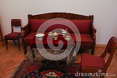 The exposition of antique furniture at the tea table. Editorial Stock Photo