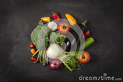Exposition of fresh organic vegetables on wooden table. tomato, pepper, broccoli, onion, garlic, cucumber, eggplant, black Eyed P Stock Photo
