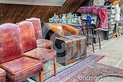 Exposition of vintage furniture at Dutch flea market Editorial Stock Photo