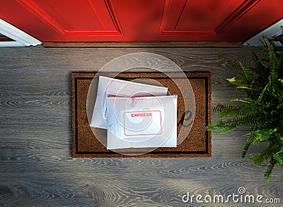 Express service envelopes delivered to door step. Stock Photo