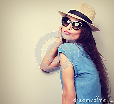 Expression female model showing kiss sign by lips clothing in fa Stock Photo