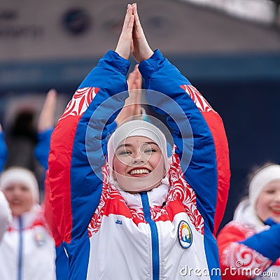 Expression performance of pretty girls of dance group in clothes with symbols of Russia Editorial Stock Photo