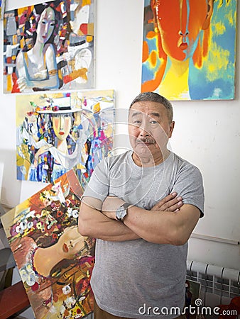 Expressionist artist in his art studio Stock Photo