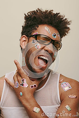 expressive african american fella in sunglasses Stock Photo