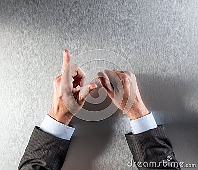 Expressive businessman hands counting, showing moderation or reflection at office Stock Photo