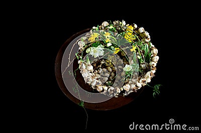 Exquisite flower arrangement with mushrooms and daffodils Stock Photo