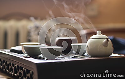 Exquisite Hot Tea in Teapot at Traditional Chinese Tea Ceremony. Set of Equipment Stock Photo