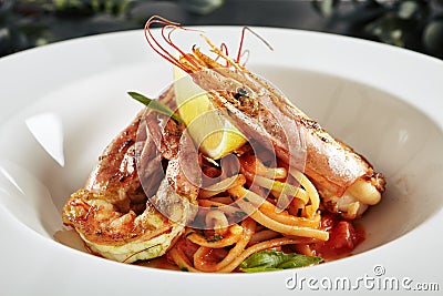 Exquisite Serving Creative Restaurant Food with Grilled Tiger Prawns and Smoked Sweet Pepper Cream Top View Stock Photo