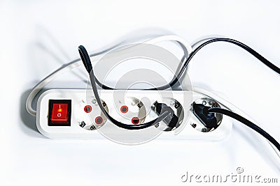 Extension cord with a button on a white background. Isolate. Copy space.View from above. Flat lay. Stock Photo