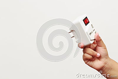 An extension socket is a device that consists of several components, such as a power cord, Stock Photo