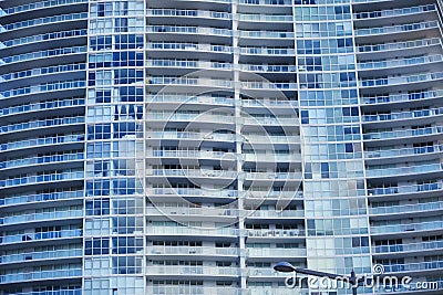 Exterior architecture of tall building with apartment homes Stock Photo