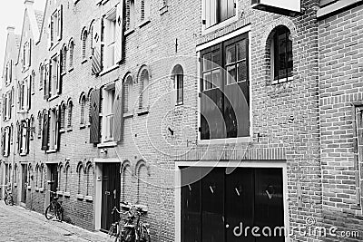 Exterior brick wall of building in perspective and black and white Editorial Stock Photo