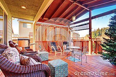 Exterior covered patio with furniture. Stock Photo