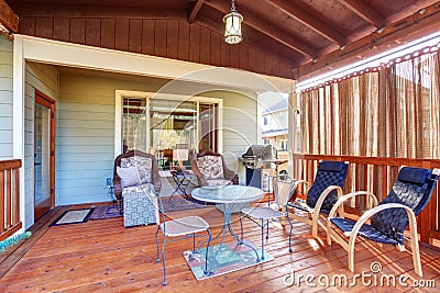 Exterior covered patio with furniture. Stock Photo