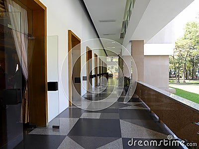 An exterior hallway and many doors at the independence palace Saigon Stock Photo